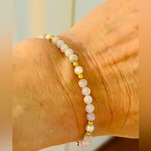14K gold, culture pearl and rose quartz bracelet. Standard women’s 7”